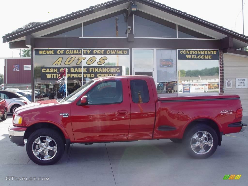 2000 F150 XLT Extended Cab 4x4 - Bright Red / Medium Graphite photo #1