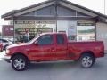 2000 Bright Red Ford F150 XLT Extended Cab 4x4  photo #1