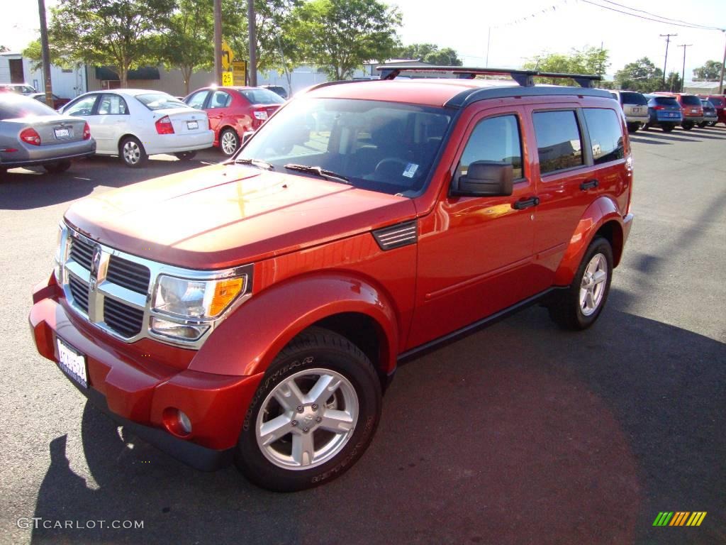 2007 Nitro SLT 4x4 - Sunburst Orange Pearl / Dark Slate Gray/Light Slate Gray photo #1