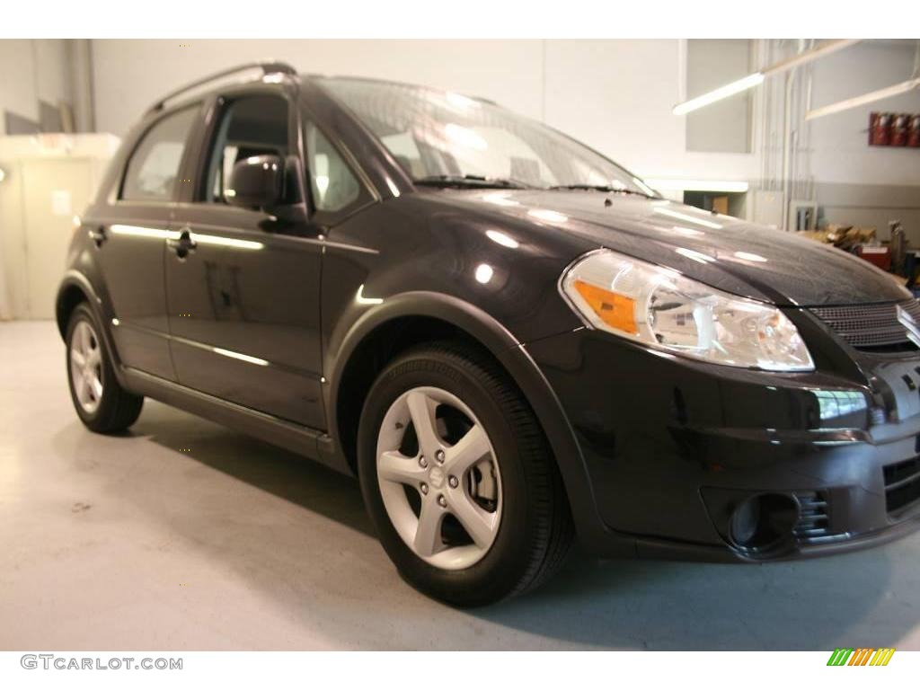 2009 SX4 Crossover Technology AWD - Black Pearl Metallic / Black photo #1