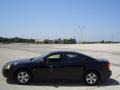 2008 Black Pontiac Grand Prix Sedan  photo #5