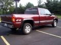 2000 Dark Carmine Red Metallic Chevrolet Silverado 1500 LS Extended Cab 4x4  photo #16