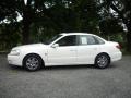 Cream White - L Series L200 Sedan Photo No. 2