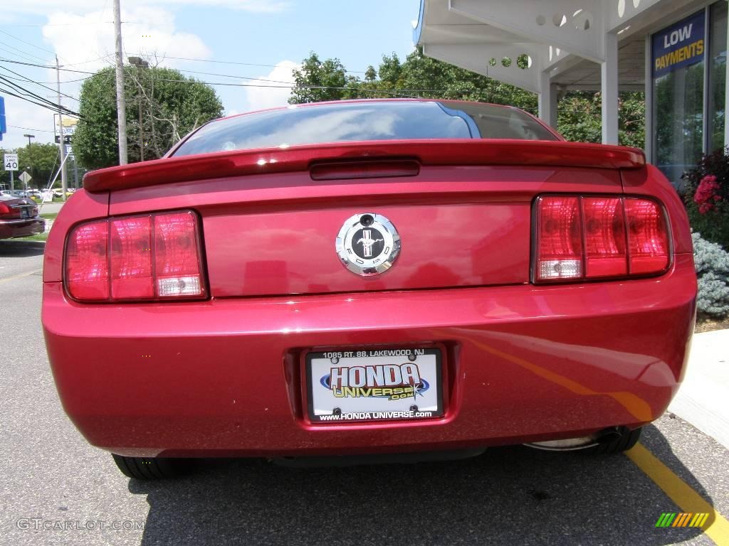 2007 Mustang V6 Deluxe Coupe - Redfire Metallic / Light Graphite photo #5