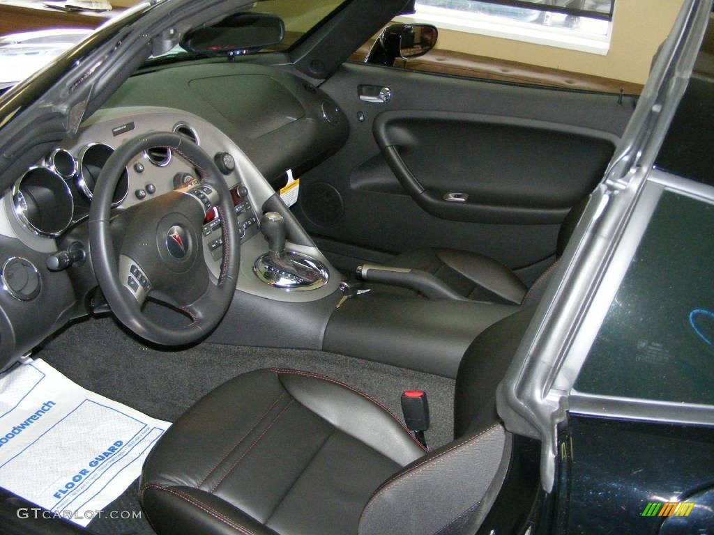2009 Solstice GXP Coupe - Mysterious Black / Ebony/Red Stitching photo #9