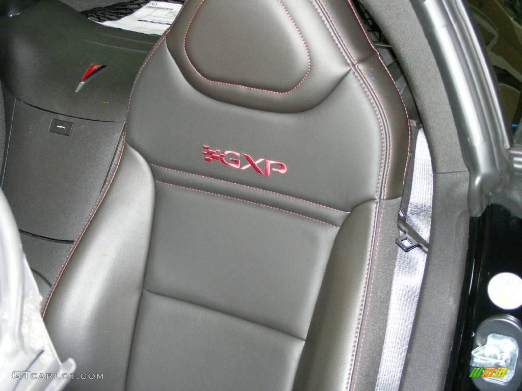 2009 Solstice GXP Coupe - Mysterious Black / Ebony/Red Stitching photo #14