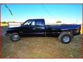 2001 Black Dodge Ram 3500 SLT Quad Cab Dually  photo #2