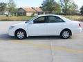 2004 Super White Toyota Camry LE  photo #2