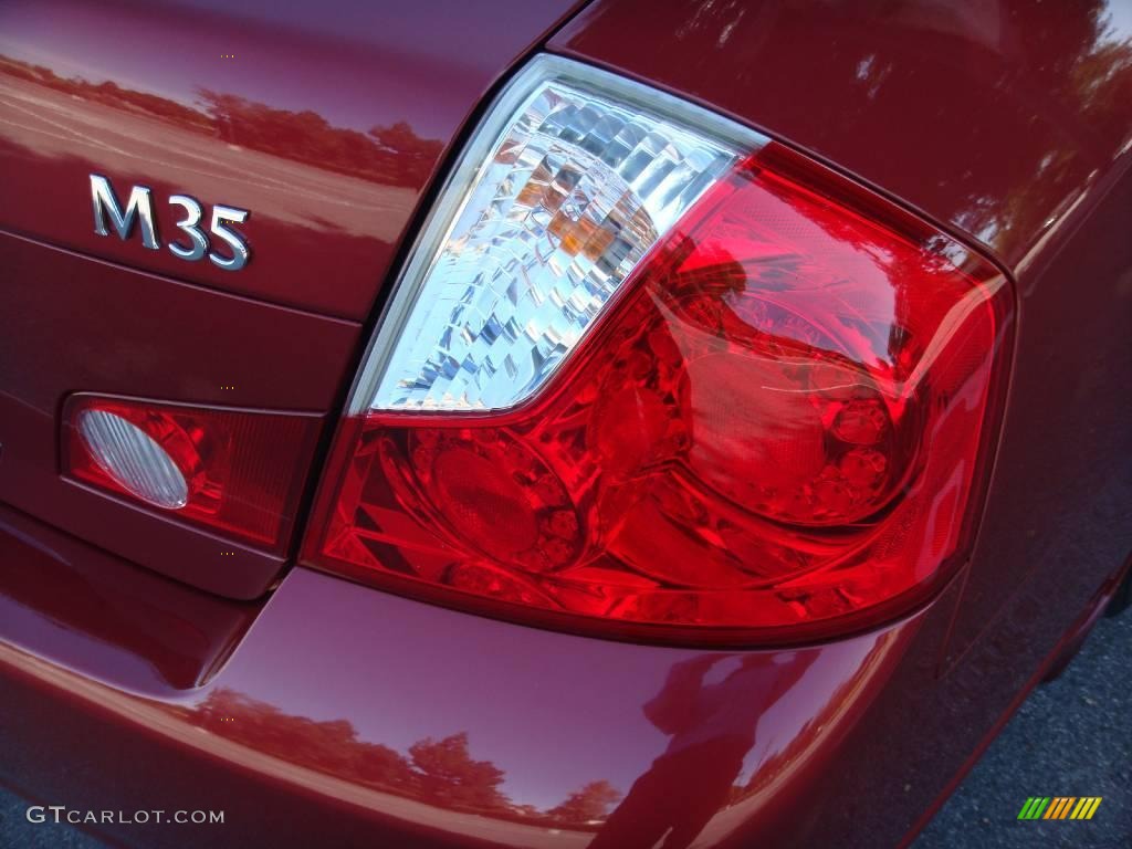 2006 M 35 Sport Sedan - Crimson Roulette Pearl / Graphite photo #18