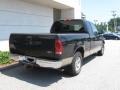 1999 Black Ford F150 XLT Extended Cab  photo #3