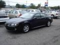 2008 Black Pontiac Grand Prix Sedan  photo #1