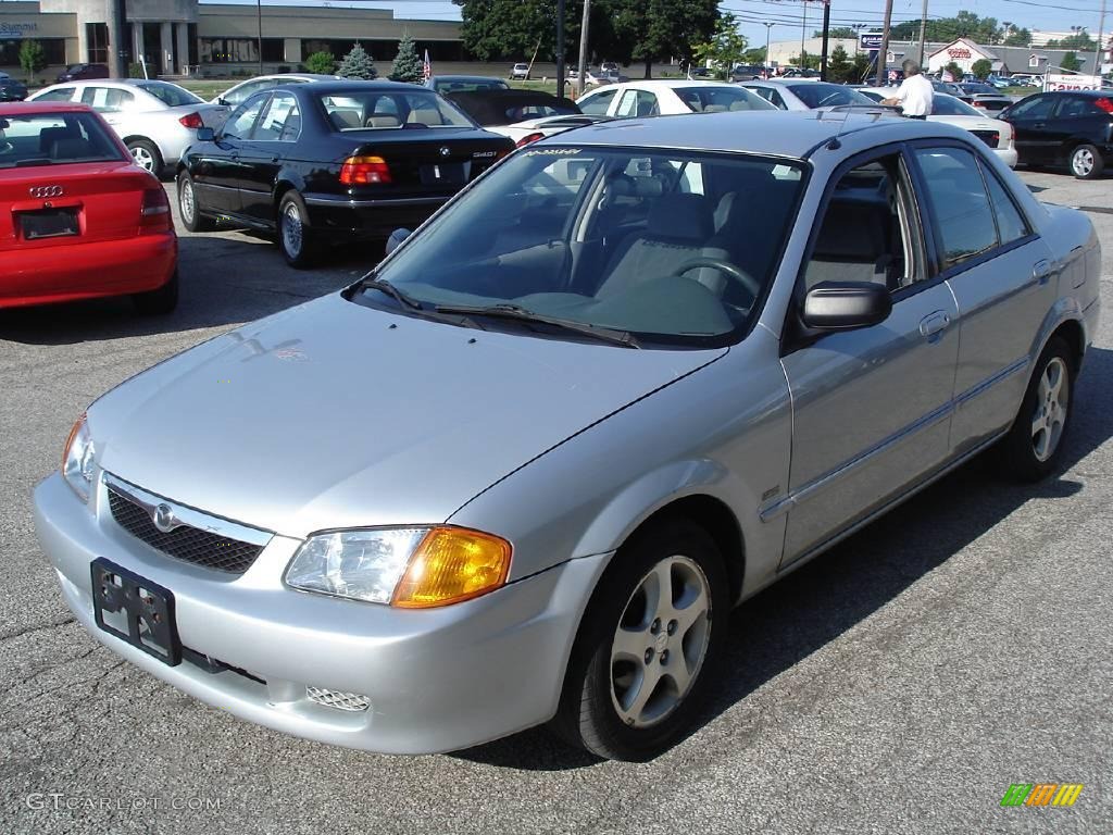 Highlight Silver Metallic Mazda Protege