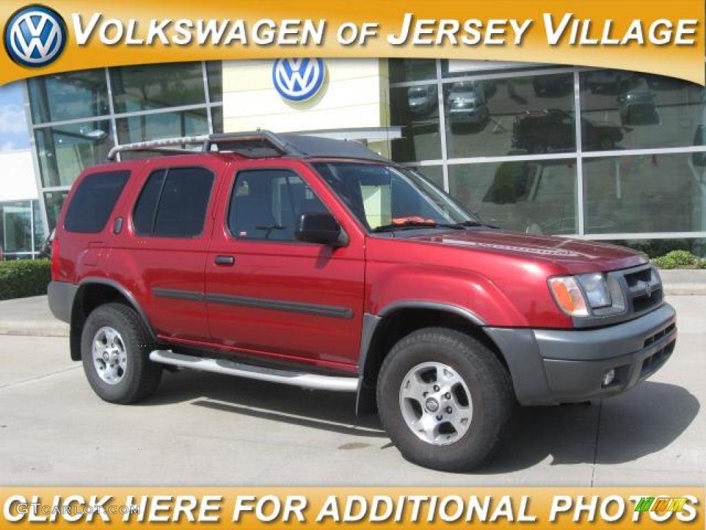 2001 Xterra XE V6 - Salsa Red Metallic / Dusk Gray photo #1