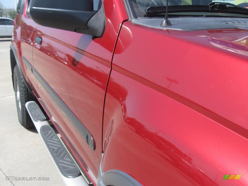 2001 Xterra XE V6 - Salsa Red Metallic / Dusk Gray photo #23