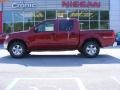 2009 Red Brick Nissan Frontier SE Crew Cab  photo #1