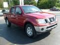 2009 Red Brick Nissan Frontier SE Crew Cab 4x4  photo #6