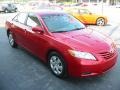 2009 Barcelona Red Metallic Toyota Camry LE  photo #2