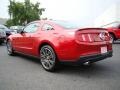 2010 Red Candy Metallic Ford Mustang GT Premium Coupe  photo #22