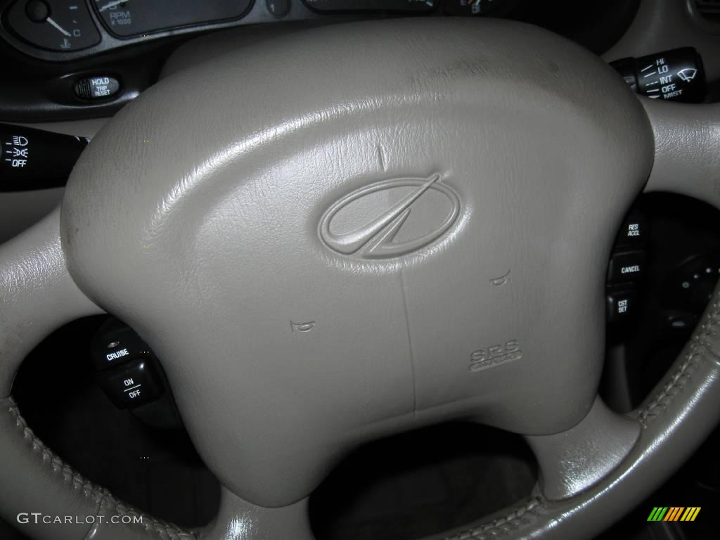1999 Alero GL Sedan - Gold Metallic / Neutral photo #9