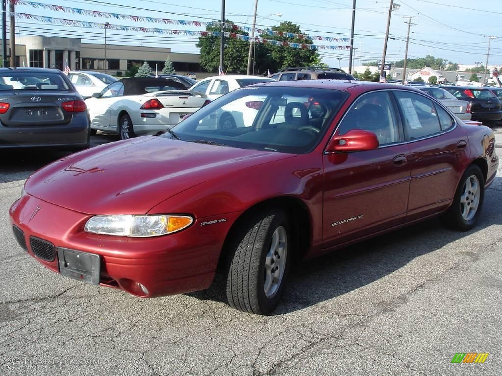 1998 Grand Prix SE Sedan - Medium Red Metallic / Graphite photo #1