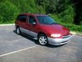 Sunset Red Pearl 2001 Nissan Quest SE