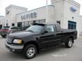 1999 Black Ford F150 XLT Extended Cab 4x4  photo #1