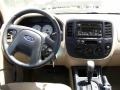 2005 Gold Ash Metallic Ford Escape XLS  photo #38