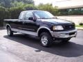 1997 Black Ford F150 XLT Extended Cab 4x4  photo #14