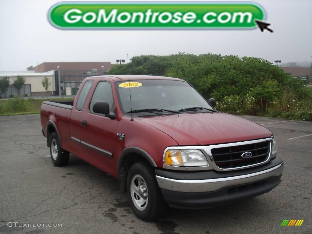 2002 F150 XL SuperCab - Toreador Red Metallic / Medium Graphite photo #21