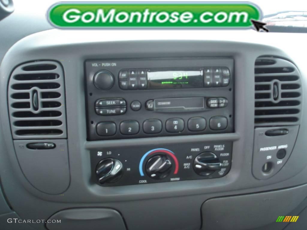 2002 F150 XL SuperCab - Toreador Red Metallic / Medium Graphite photo #28