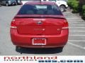 2010 Sangria Red Metallic Ford Focus SE Sedan  photo #7