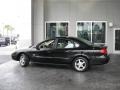 2003 Black Ford Taurus SEL  photo #5