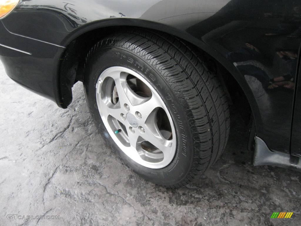 2003 Taurus SEL - Black / Medium Graphite photo #6