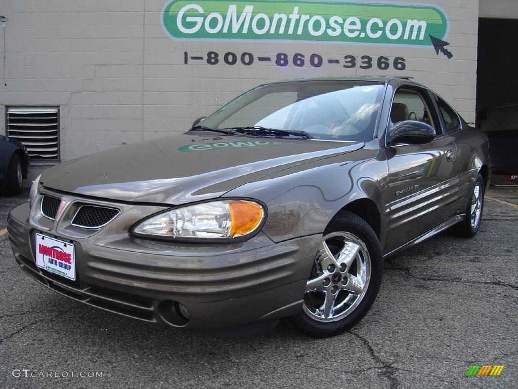 2002 Grand Am SE Coupe - Dark Bronzemist Metallic / Dark Taupe photo #1