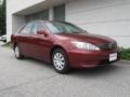 2006 Salsa Red Pearl Toyota Camry LE  photo #1