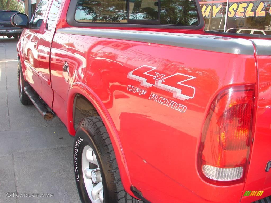 1999 F150 XLT Extended Cab 4x4 - Bright Red / Dark Graphite photo #18