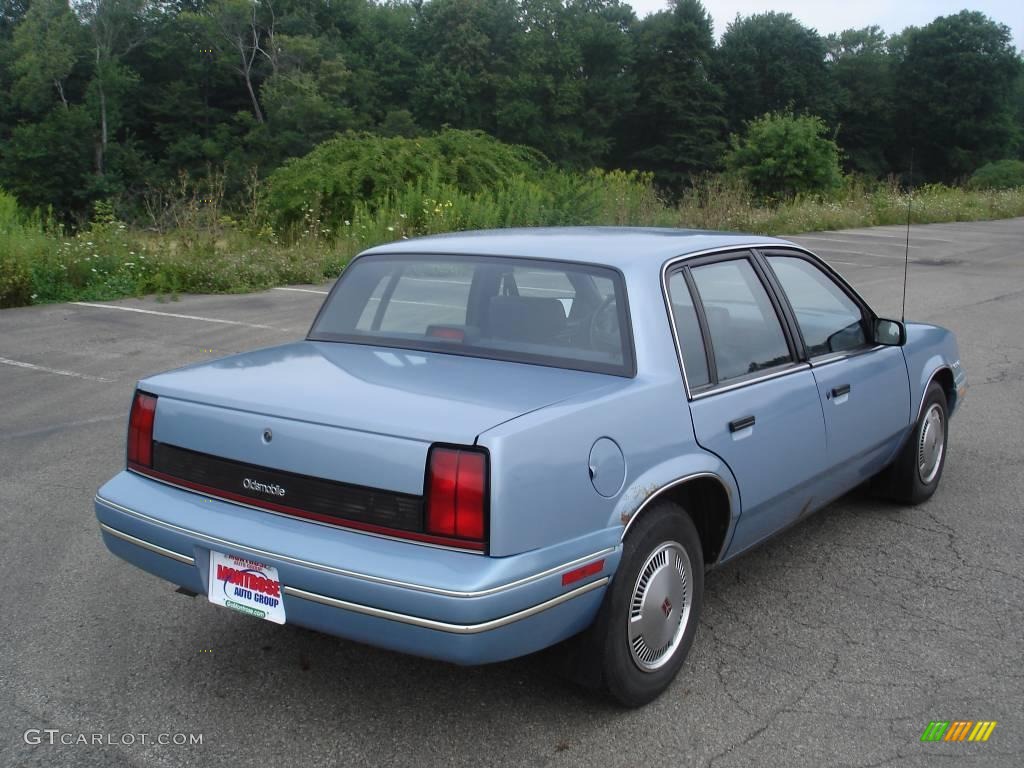 1991 Cutlass Calais Sedan - Light Sapphire Blue Metallic / Blue photo #3