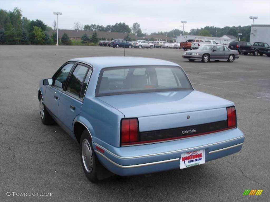 1991 Cutlass Calais Sedan - Light Sapphire Blue Metallic / Blue photo #5