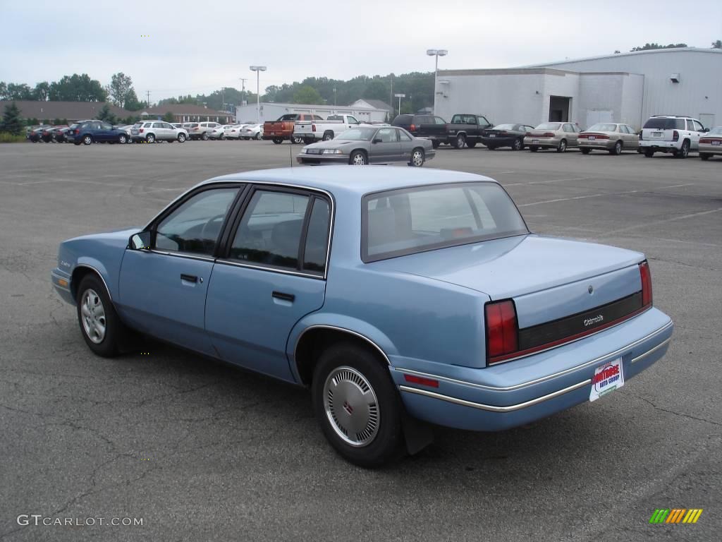 1991 Cutlass Calais Sedan - Light Sapphire Blue Metallic / Blue photo #6