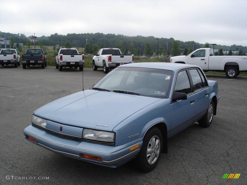 1991 Cutlass Calais Sedan - Light Sapphire Blue Metallic / Blue photo #19