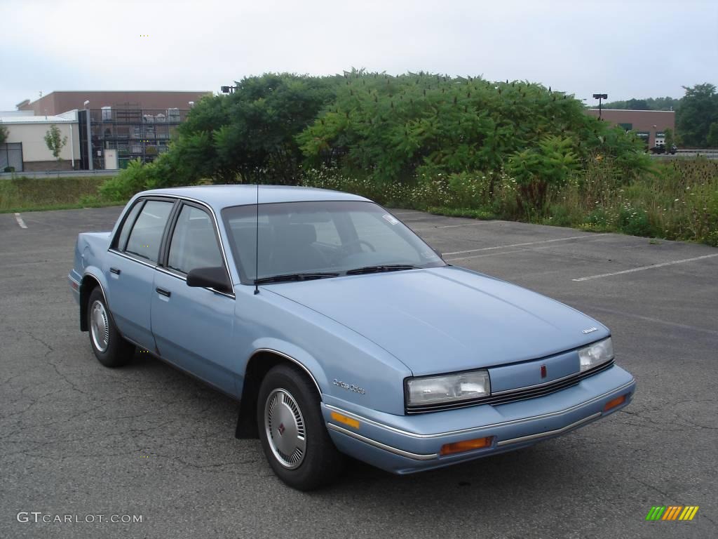 1991 Cutlass Calais Sedan - Light Sapphire Blue Metallic / Blue photo #21