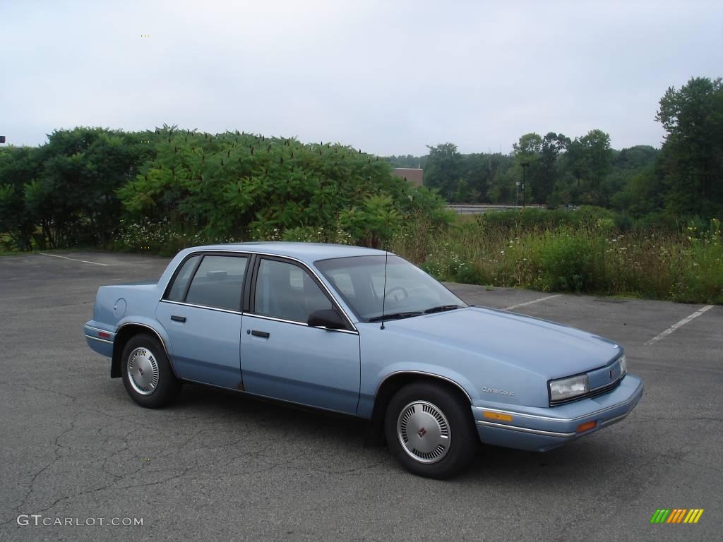 1991 Cutlass Calais Sedan - Light Sapphire Blue Metallic / Blue photo #22