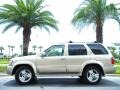 2002 Golden Sand Metallic Infiniti QX4 4x4  photo #1