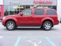 Red Brick 2009 Nissan Pathfinder SE