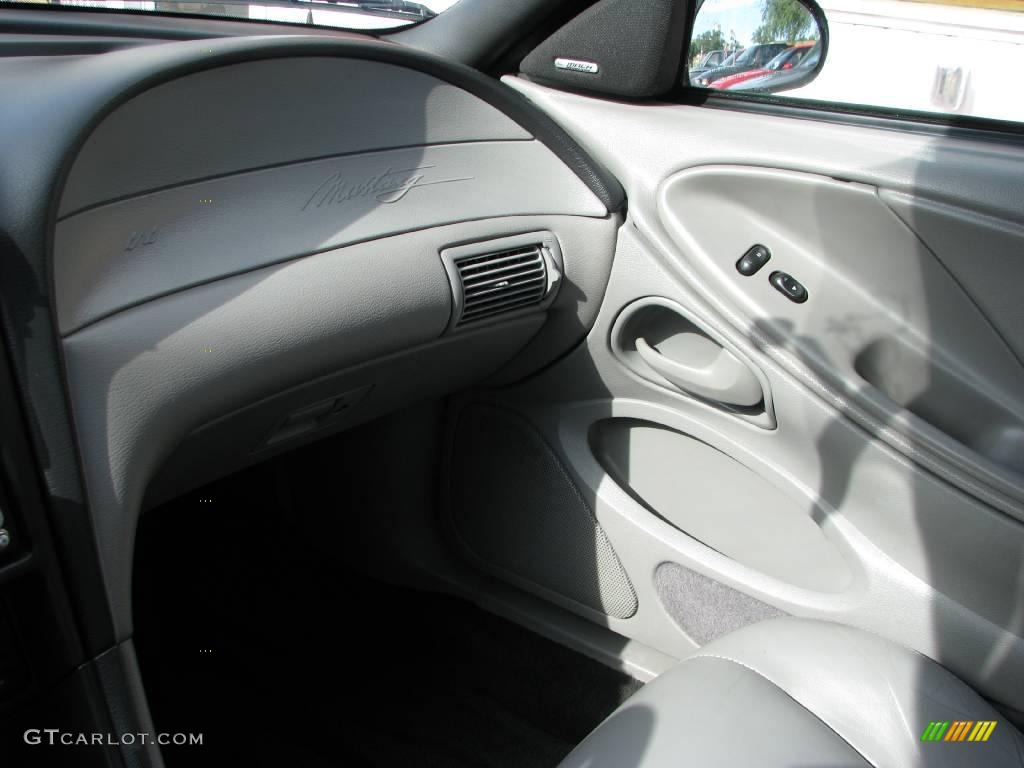 2000 Mustang GT Coupe - Electric Green Metallic / Medium Graphite photo #7