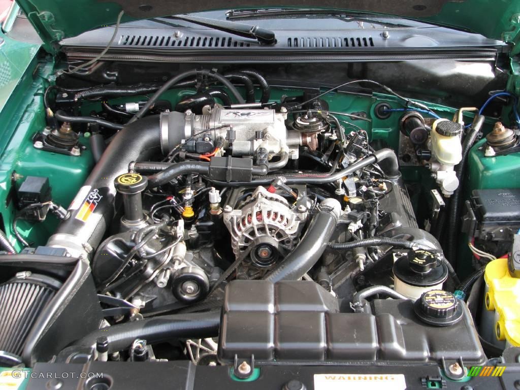 2000 Mustang GT Coupe - Electric Green Metallic / Medium Graphite photo #20
