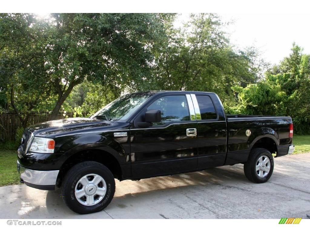 2004 F150 STX SuperCab 4x4 - Black / Medium Graphite photo #3