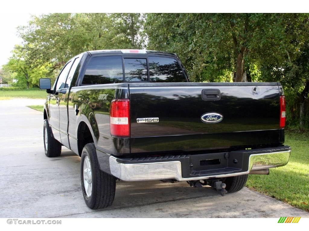 2004 F150 STX SuperCab 4x4 - Black / Medium Graphite photo #8