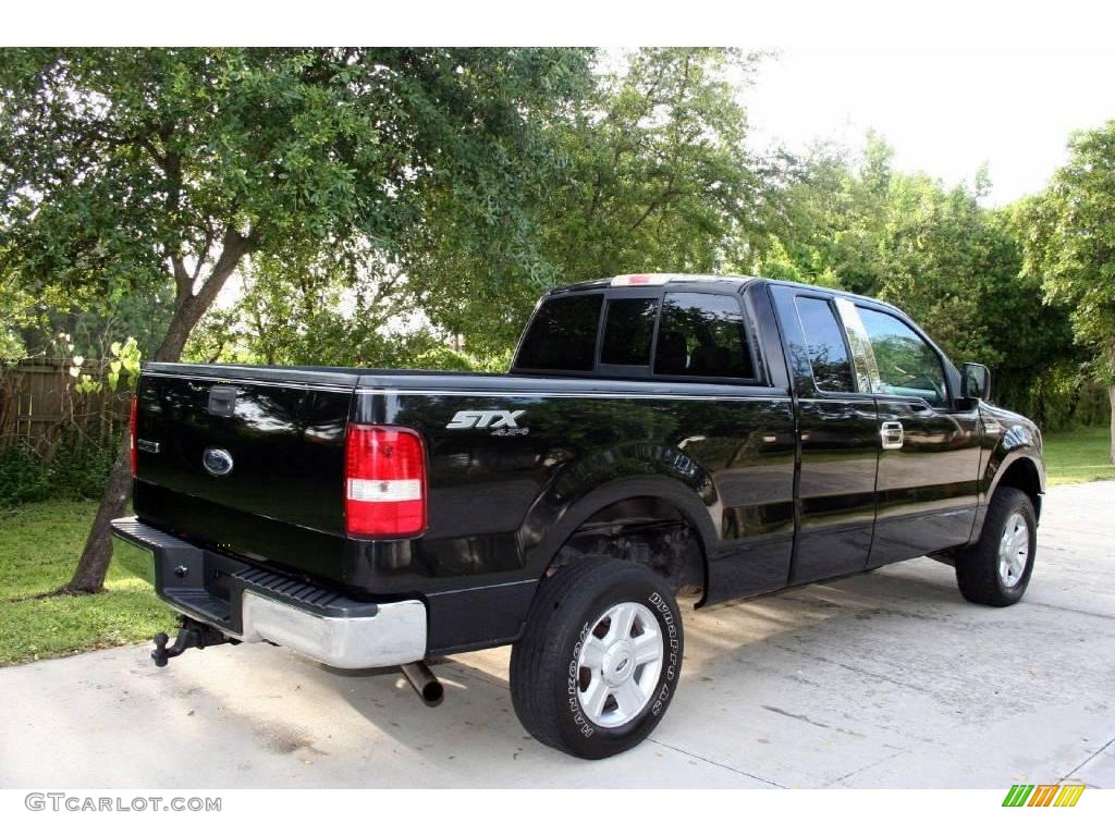 2004 F150 STX SuperCab 4x4 - Black / Medium Graphite photo #11