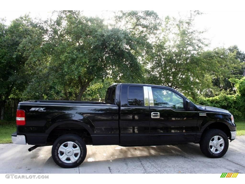 2004 F150 STX SuperCab 4x4 - Black / Medium Graphite photo #13